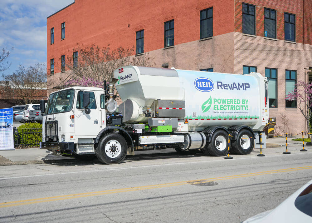 Heil RevAMP electric garbage truck at grand opening event